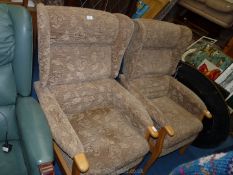 A pair of Parker Knowle style lounge chairs.