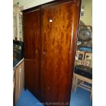 A Stag "Minstrel" double Wardrobe, 70'' high x 48'' wide x 22'' deep.