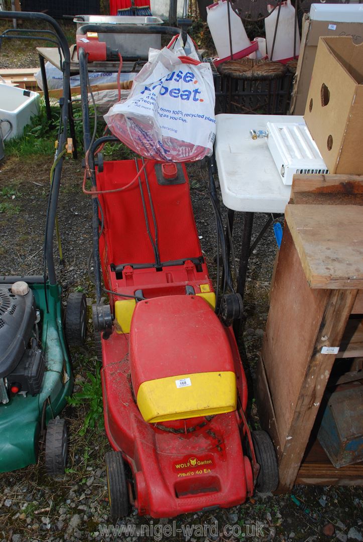 A Wolf electric mower.