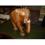 A large carved elephant, 15" tall.