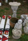 Two ornamental bird baths and plant pot.