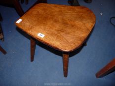 A rustic plank topped stool.