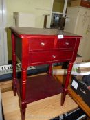 A stained red wood side table, 27 1/2" tall.