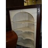 A large dark wood corner cabinet with white painted interior, 57 1/2" high x 43" wide x 29" deep.