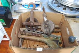 Two rope pulleys and a Clay pigeon trap.