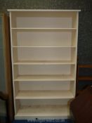 A large white painted shelving unit, 85'' high x 48'' wide x 14 1/2'' deep.