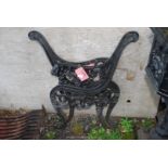 A pair of cast iron bench ends.