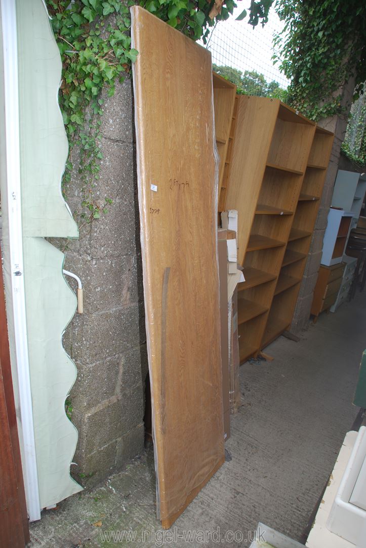 A light Oak grain pattern Working Surface, 7' long x 2' wide, (as new in plastic wrapping).