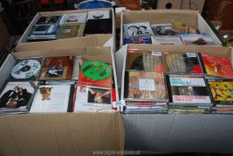 Four large boxes of classical CD's.