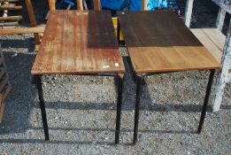Two stacking school tables.