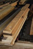 Seven lengths of softwood 7 1/2" x 2" x 77" long (average).