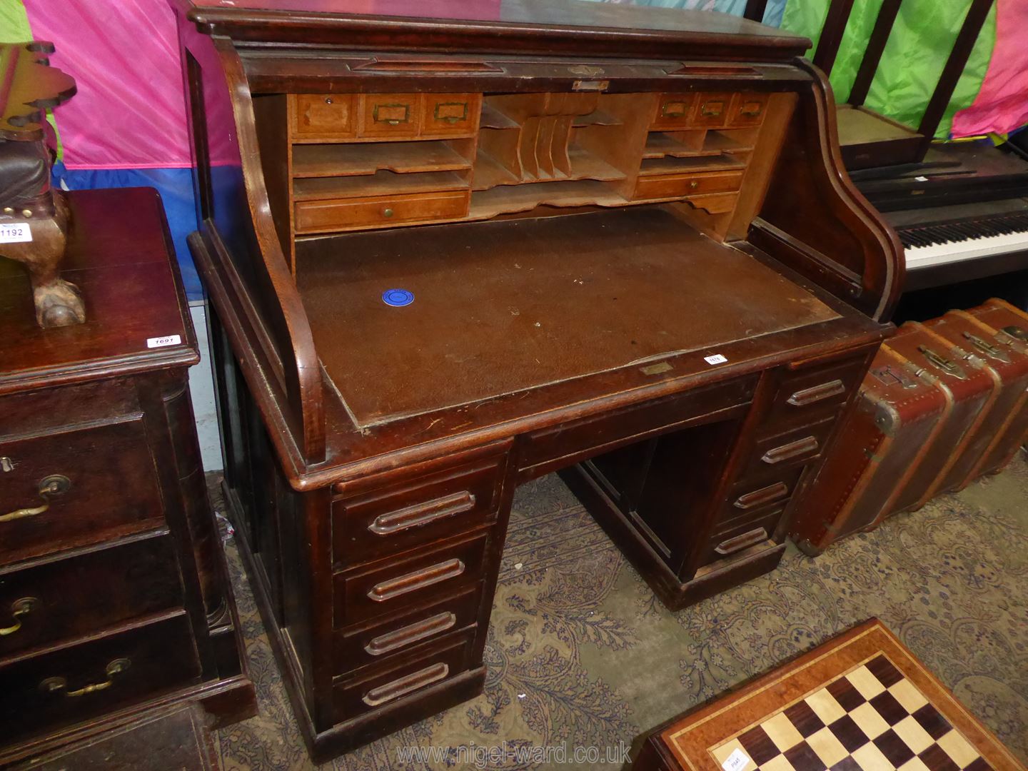 A dark Oak double pedestal Roll Top Desk,