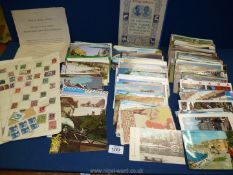 A large quantity of mixed Postcards and a few foreign stamps,