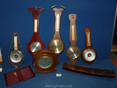 A quantity of Barometers including wooden, metal, banjo shaped etc.