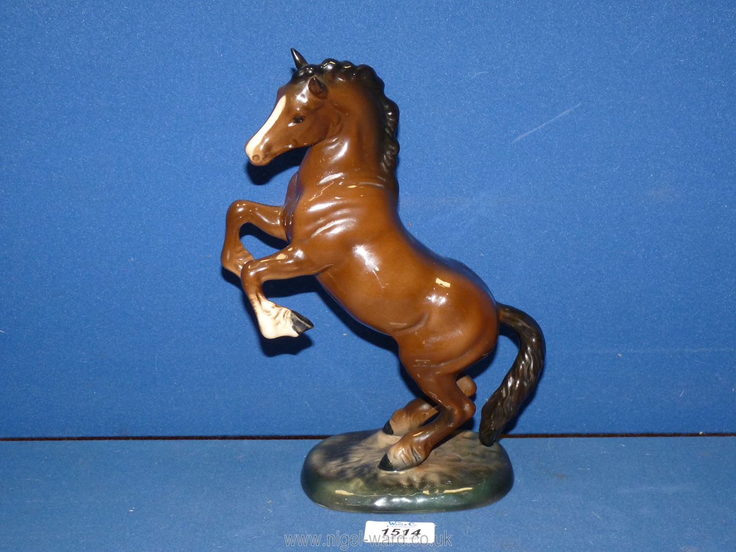 A Beswick bay rearing horse no. 1014, 10" tall.