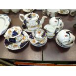 A Gaudy Welsh china Teaset with eight cups, twelve saucers, teapot, jug,