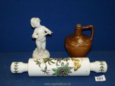 A Portmeirion passion flower rolling pin (chipped,