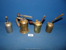 Four small Blow lamps including "Champion" with base filler, a "Primus No.