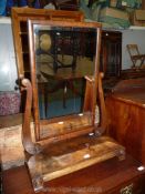 An unusually large circa 1900 Mahogany swing Mirror with bevelled glass,