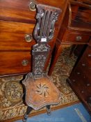 An arts & crafts lyre backed carved detailed Spinning Chair,