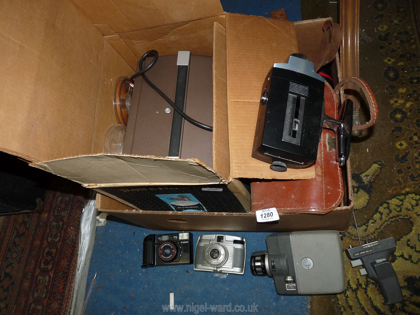 A Bell & Howell 'Super 8 Autoload' projector (boxed), an Elmo 8-S zoom auto-eye film camera,