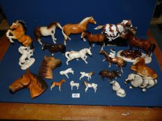 A quantity of horse ornaments including Melba ware, 'Cheval Ceramics,' Beckwood horse and jockey,