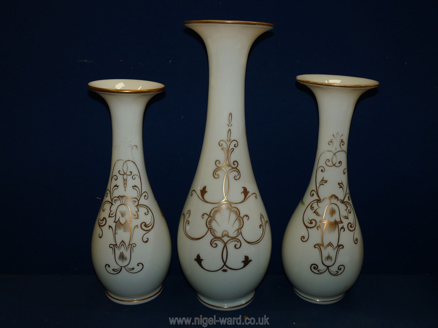 A garniture of three Victorian opaque glass Vases with hand painted flowers, - Image 4 of 17