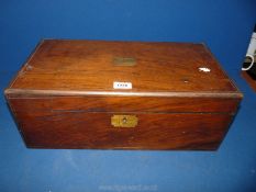 An Oak Writing Slope with black leather interior, some wear. 19 1/2" x 10 1/2" x 7 1/2" high.