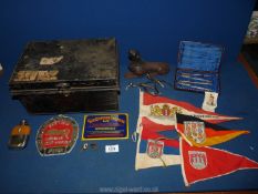 A metal box, a metal door stop, a small quantity of Players cigarette cards,