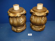 Two carved gilt wooden lamp bases, 11" tall.