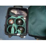 Four Thomas Taylor size 2 bowls for Abergavenny bowling club, plus a pair of shoes, gloves,