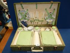 A mid-century Brexton's picnic set with original label, one hinge a/f.