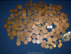 A quantity of old British coins including pennies, shillings, three pence pieces including Victoria,