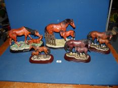 A quantity of Juliana and Leonardo collection of mares and foals on plinths (some chips.