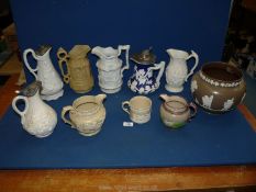 A highly decorated embossed jug in Paragon ware and other jugs and water jugs, a mug, etc.