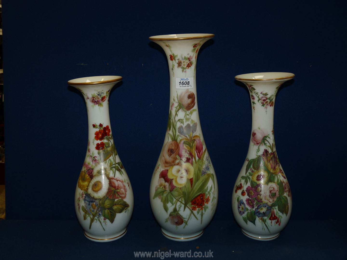 A garniture of three Victorian opaque glass Vases with hand painted flowers, - Image 2 of 17