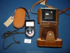 An Ensign Selfix 16-20 camera with 75mm lens and a Western Master Universal exposure meter both in