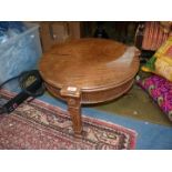 A mixed woods circular occasional Table in Empire style, carved harebell and fluted apron,