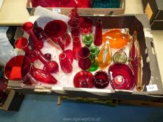 A quantity of red glass vases, bird shape bowls, boat shape vase, etc.