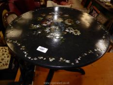 A circular occasional Table,
