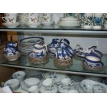 A large quantity of blue and white tea and dinner ware, Royal Doulton and Booths Old Willow pattern,
