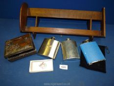 Three hip flasks and an oriental bronze effect tin with embossed floral detail, a 1966 Province R.M.