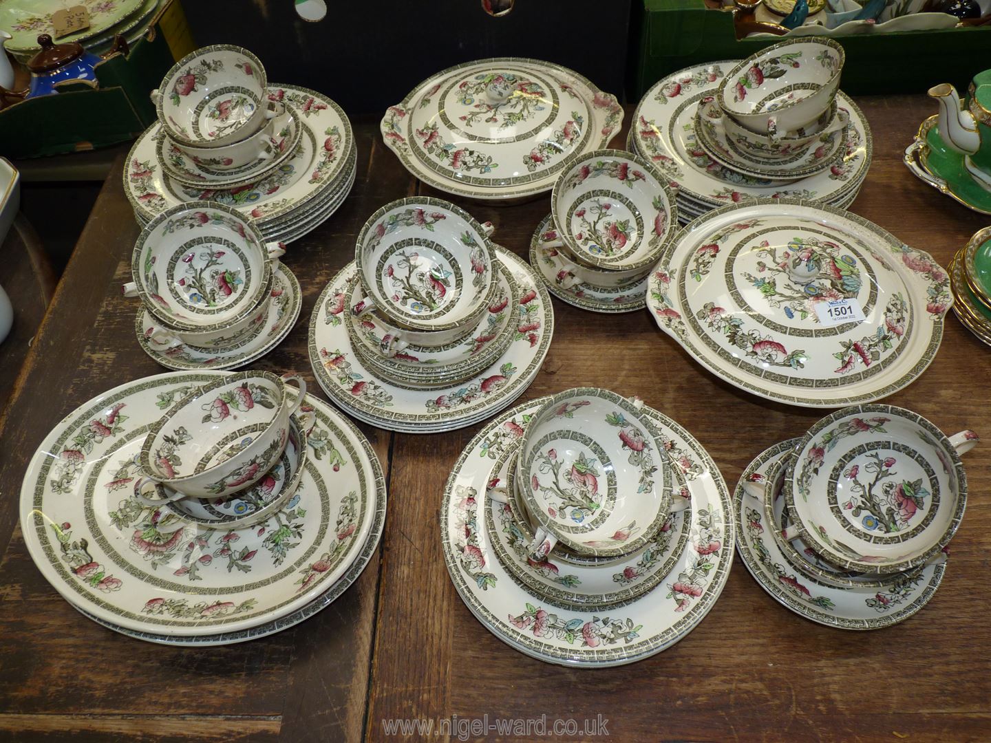 A quantity of 'Indian Tree' Johnson Bros dinnerware to include; two meat plates, two lidded tureens,