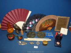 A quantity of miscellaneous including fans, bronze effect owl, inlaid photo frame, yew wood vase,