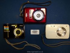 Three digital cameras to include a Nikon Coolpix 3.