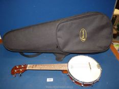 A cased Kmise four string banjo ukulele, in a violin case.