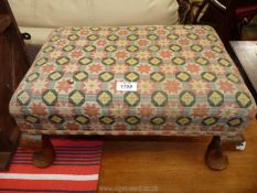 A rectangular Stool having brief cabriole legs and geometric patterned tapestry upholstery,