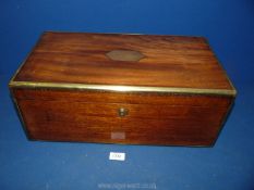 A Mahogany writing Box with brass trim to edge, secret drawer and embossed leather slope, 20" wide .