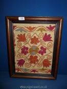 A decorative vintage Uzbekistan Suzani cotton and silk framed fabric, framed, 15" x 19 1/2".