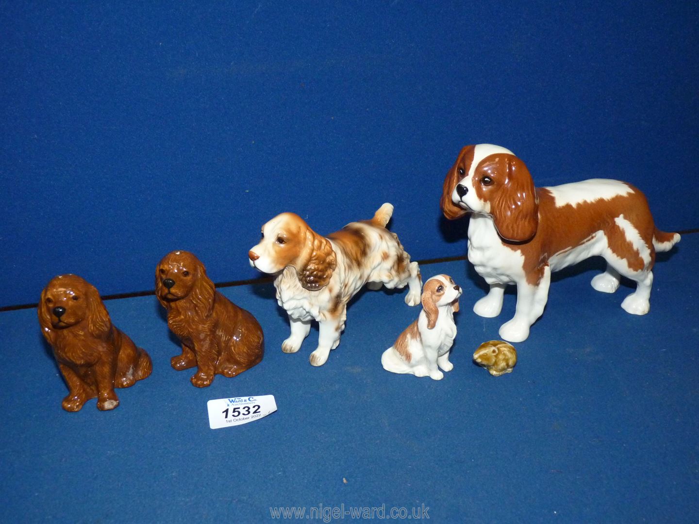 Two Beswick Cavalier King Charles Spaniel in tan and white (one large and one small,